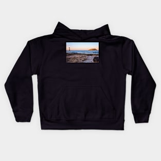 Sun setting on Puffin Island, North Wales Kids Hoodie